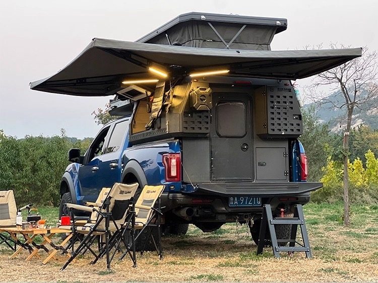 Pickup camper with awning
